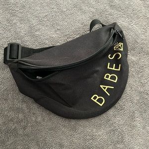 Black Fanny pack or crossbody bag.